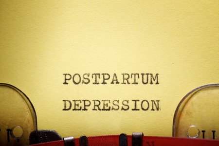 Postpartum depression text written with a typewriter.の写真素材
