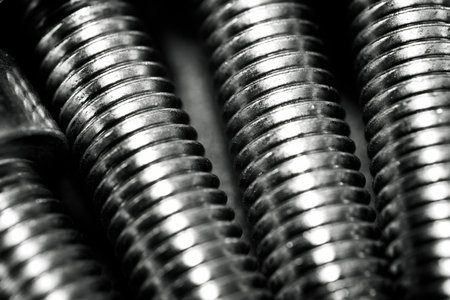 Close up of metal fastener bolts group.