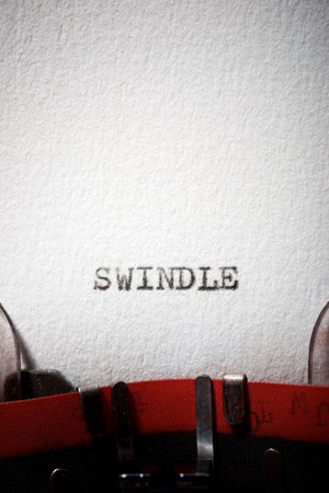 Swindle word written with a typewriter.の写真素材