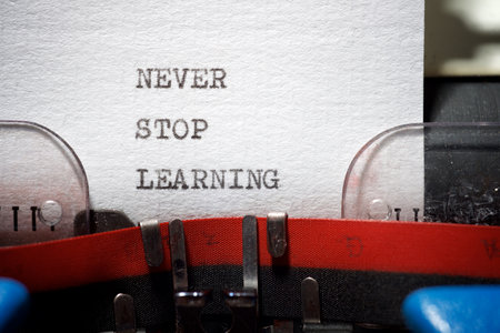 Never stop learning phrase written with a typewriter.の写真素材