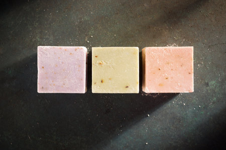 Cube-shaped bars of soap on a tableの写真素材