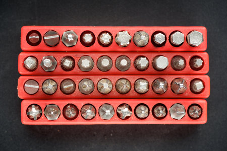 Close up of a group of screwdriver tips for fastening screws.の写真素材