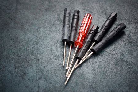Close up of precision screwdrivers group on a surfaceの写真素材