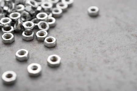 Close up of some metal nuts for fixing of fasteners