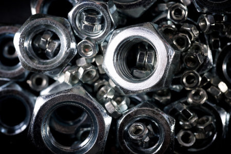 Close up of some metal nuts for fixing of fasteners