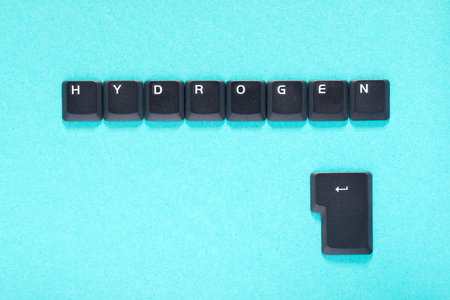 Close up of the keys of an old laptop keyboard creating hydrogen word