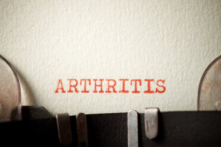 Arthritis word written with a typewriter.