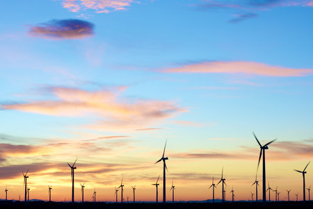Wind turbine generators for sustainable electrical energy production in Spain at sunriseの写真素材