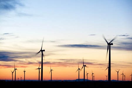 Wind turbine generators for sustainable electrical energy production in Spain at sunriseの写真素材