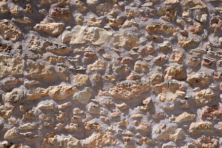 Texture of an old stone wall in Spainの写真素材