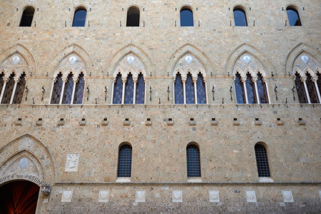 Facade of Salimbeni Palace in Siena, Tuscany, Italy.の写真素材