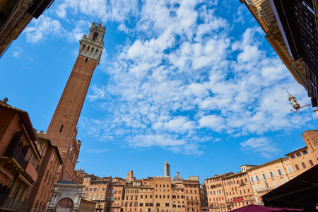 View of tower in Campo Square in Siena, Tuscany, Italy.の写真素材