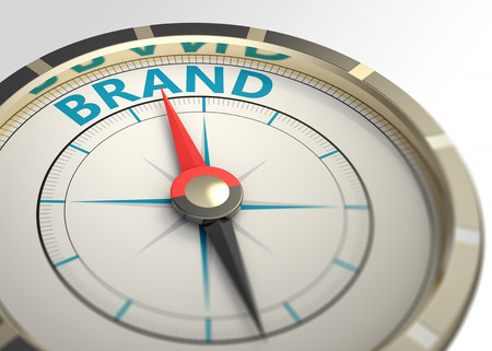 Compass and an arrow pointing to the word brandの写真素材