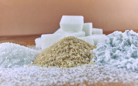 Sugar different types on a wooden table.の写真素材