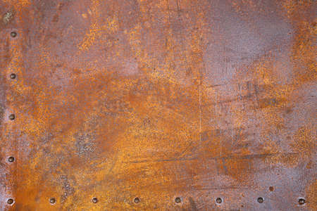 rusty iron texture. Rustic iron plate with rivets.の写真素材