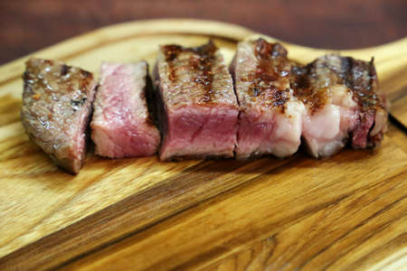 I cry. Brazilian barbecue. Steak cut on a wooden board.の写真素材