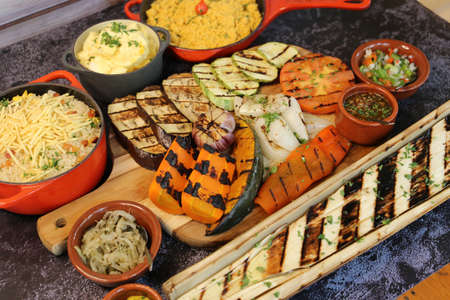 Brazilian food. Heart of palm, pumpkin & grilled vegetables on the barbecue.の写真素材