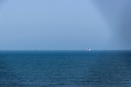 Ships waiting at sea at Pitangueiras Beach in Guaruja, Sao Paulo