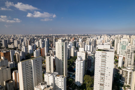 This vibrant aerial panorama captures Campo Belo in SÃ£o Paulo with its mix of modern high-rises...