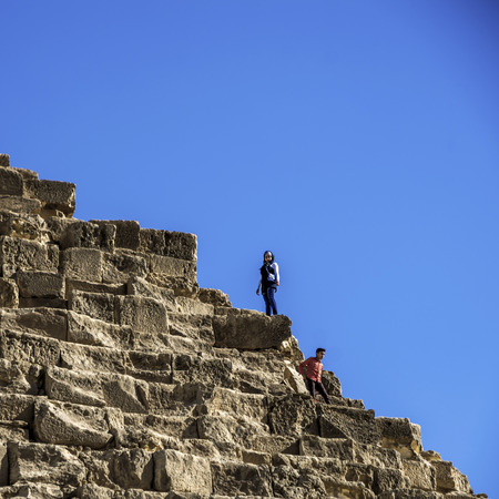 CAIRO-DECEMBER 4, 2015: local Egyptians tourists are the majority at the Pyramids as foreign tourism dropped drastically.のeditorial素材
