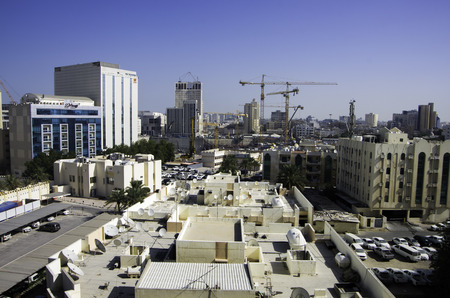 Doha, QATAR -DECEMBER 25, 2016: Landscape of Doha under construction with building sites and cranes.