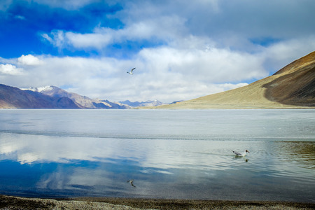 Scenic View Of Lake And Mountain Against Skyの写真素材