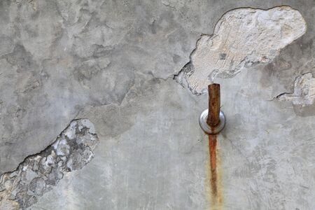 Faucet old cement wallの写真素材