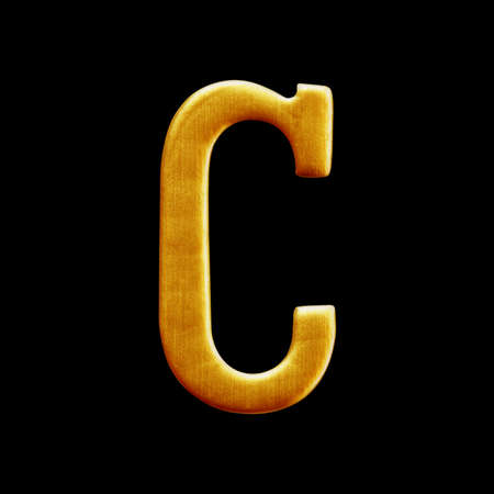 golden letter collection - C  isolated on black backgroundの写真素材