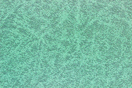 Green leather texture backgroundの写真素材