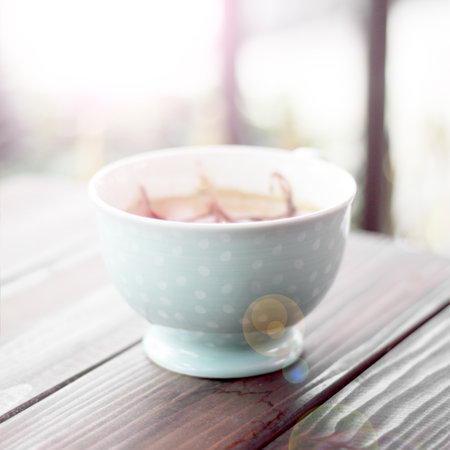 Cup of coffee or tea on wooden tableの写真素材