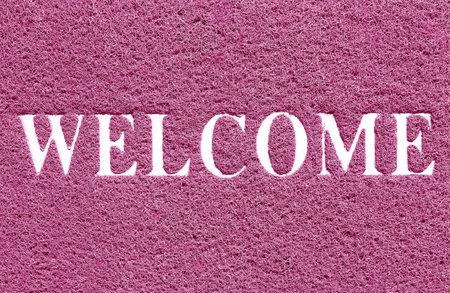 The doormat of welcome text on white backgroundの写真素材