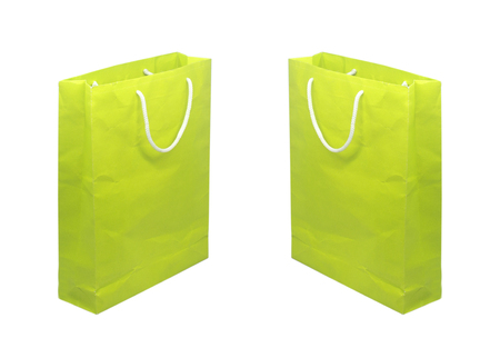Green paper bag isolated on  white backgroundの写真素材