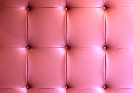 Texture of Red leather of sofa backgroundの写真素材