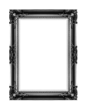Old black vintage picture frame with a decorative pattern on white backgroundの写真素材