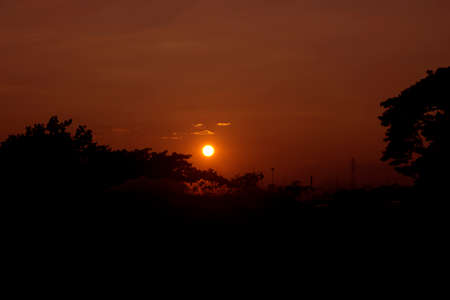 Bright orange and yellow colors sunset skyの写真素材