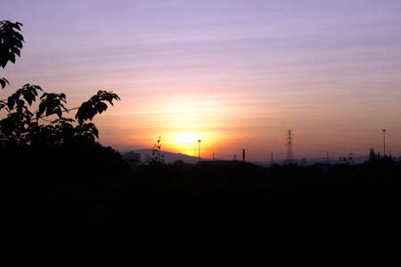 Bright orange and yellow colors sunset skyの写真素材