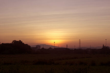 Bright orange and yellow colors sunset skyの写真素材