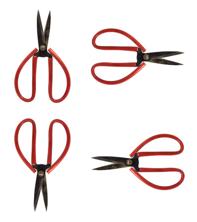 old red scissors. Object is isolated on white backgroundの写真素材