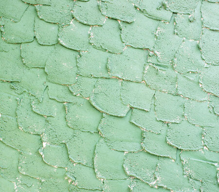 Background of the green cement wall is plaster rough styleの写真素材
