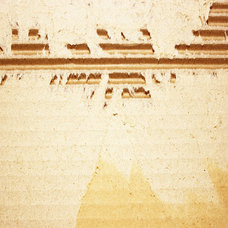 Brown corrugated cardboard sheet backgroundの写真素材