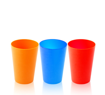 colorful plastic mug  isolated on white backgroundの写真素材
