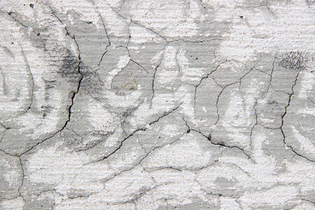 Cement wall surface cracksの写真素材