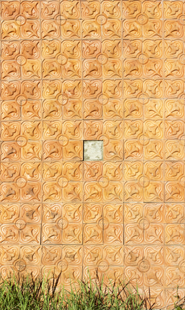 Old wall with clay tiles to disintegrationの写真素材