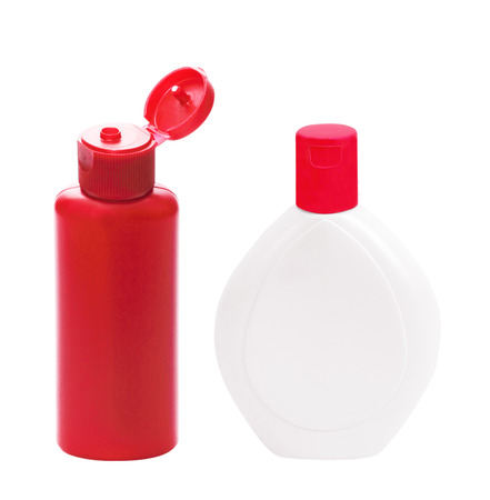 red bottle for lotion gel isolated on white backgroundの写真素材