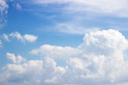 Blue sky and white clouds; Soft white clouds against blue skyの写真素材