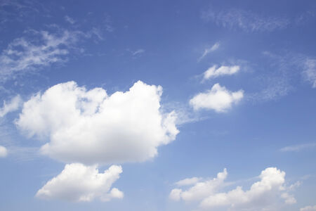 Blue sky and white clouds; Soft white clouds against blue skyの写真素材