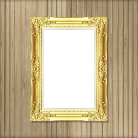 Antique gold frame on wooden wallの写真素材