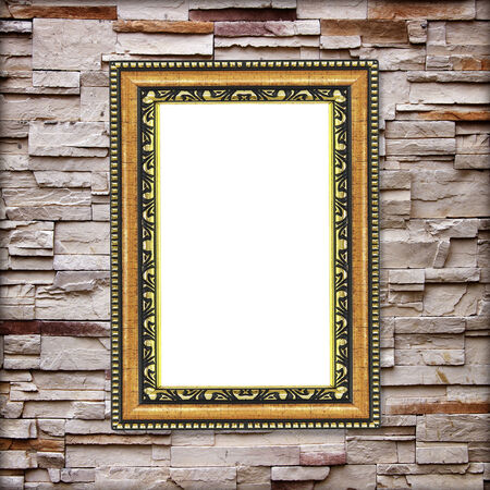Antique frame on stone wall backgroundの写真素材