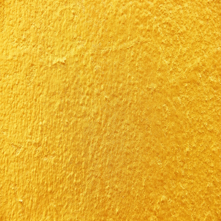 golden concrete texture backgroundの写真素材