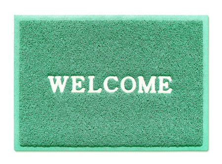 The doormat of welcome text on white backgroundの写真素材